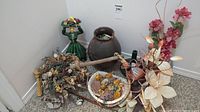 Overview of entire lot with ceramic figure, dried floral bunches, vases and baskets
