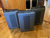 Front view of all three Winix 5300-2 units standing on floor