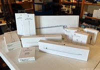 Group image of all boxed Apple accessories
