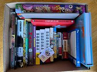Box containing all 22 books viewed from top