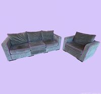 3-seat sofa and chair on plain backdrop showing overall set