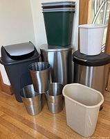 Group shot of all 12 trash cans and bins stacked and arranged