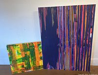 Front of both painted panels showing abstract designs