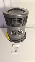Front view of Honeywell space heater showing two control knobs and vents on all sides