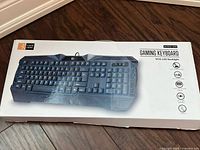 Closed box of Case Logic wired gaming keyboard with LED backlight shown on packaging.