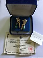 Earrings in box with COA and card