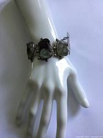 Bracelet displayed on mannequin hand showing overall appearance