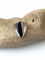 Front view of sterling silver ring with black onyx inlay