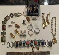 Entire lot arranged on white background showing all jewelry pieces
