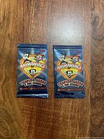 Front view of two sealed Topps Animaniacs trading card packs
