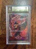Front of Beckett-slabbed Roronoa Zoro SR Alt Art card showing grade label and artwork