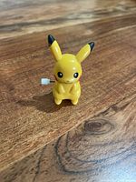 Front view of Pikachu wind-up figure