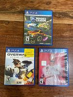 All three PS4 game cases front view