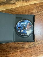 Disc in open rental case showing label side