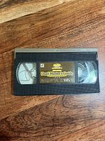 Front of VHS cassette showing gold Duel Master's Guide label