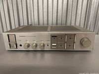 Front view of the Pioneer Stereo Amplifier A-30 WP showing knobs, switches, and power button on the silver faceplate.