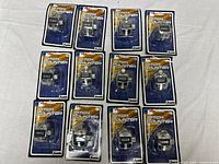 Front view showing all twelve packaged Franklin pitch counters