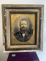 Full view of framed portrait showing size and overall condition