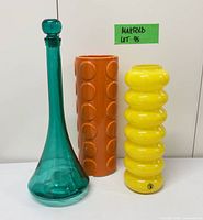 Front view of three vases side by side