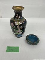 Full shot of vase and ashtray together to show both items