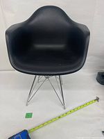 Front view of black toddler armchair