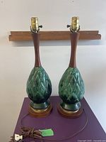 Front view of both matching lamps showing full form and bases