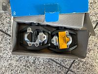 Open box showing both PD-EH500 pedals in packaging tray