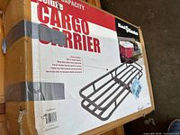 Front of box showing Haul-Master deluxe cargo carrier image and branding