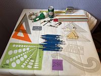 Overview of all drafting tools on table