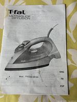 Front page of instruction manual showing brand, model