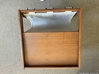 Top view of teak frame and canvas sling