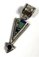 Arrow-shaped sterling silver pendant with blue and green inlaid stones, shown front view