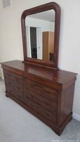 Front view of dresser with attached mirror