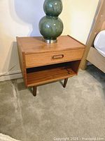 Full view of teak nightstand front and top