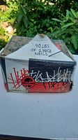 Cardboard box labeled "40 lbs of 2 inch nails" from brand TreeLand, showing the exterior packaging.