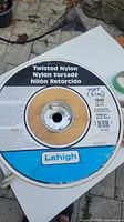 Top view of spool label showing product details including length 70ft (21m), 3/4 inch twisted nylon rope, brand Lehigh.