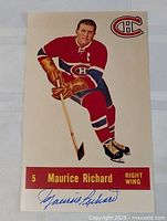 Full view of the autographed Maurice Richard hockey card showing his image in Montreal Canadiens uniform and signature at bottom.