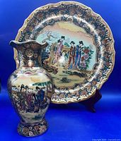 Front view of vase and charger showing overall design and colors