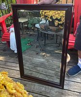 Front view showing mahogany frame and mirror glass