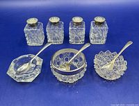 group view of shakers, cellars, spoons