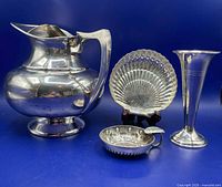 Group shot of all four silver-plated items