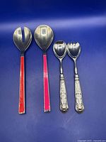 All four salad servers side by side