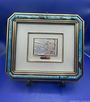 Full view of framed plaque with stand