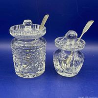 Both Waterford crystal condiment jars with lids and spoons