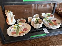 Full set displayed on shelf showing all pieces