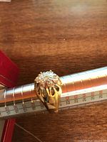 Cluster view showing diamond arrangement and metal tone