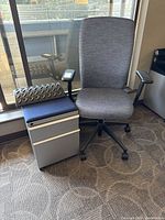 Chair and file cabinet side by side showing overall appearance
