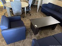 Armchair and coffee table in lounge setting