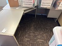 Overhead view showing both desk sections forming L-shape