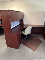 Full view of L-shaped desk, hutch, pedestal and chair